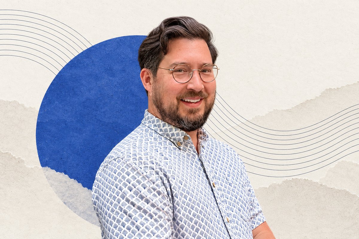 Portrait of Dr Wm. Matthew Kennedy against an ivory and cobalt editorial backdrop.